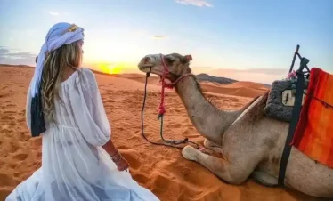 desert woman with camel
